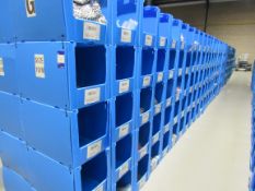Large quantity of assorted clothing to part row G (including corrugated pigeon holes)