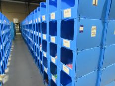 Large quantity of assorted clothing to part row I (including corrugated pigeon holes)