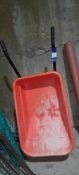 Orange plastic wheelbarrow