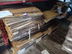 Large quantity of cardboard boxes to bottom shelf of racking