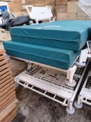 2 Hospital trolleys with 2 pressure care mattresse