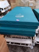 2 Hospital trolleys with 2 pressure care mattresse