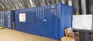 Converted 20ft (approx.) shipping container with shuttered windows to each side and 1x door to