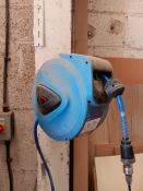 Wall mounted retractable air line hose reel