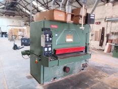 Wadkin model W/LC-RT1300 wide belt sander Year 1979 with belt trolley and various boxed belts (Not