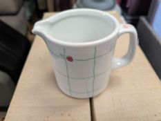 60 X Small milk style jugs with a green pattern.