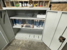 About 70 No tubes misc. mastic and a steel cupboard