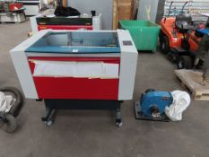 A TROTEC Speedy 300 Lazer Engraving Machine.