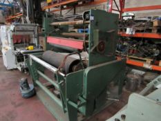 Afex double winder, 1100mm max roll width and 1900mm overall machine width.
