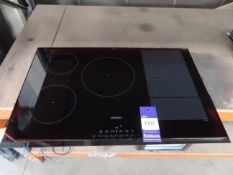 A Siemens Induction Hob Model HM1501D2 (Unused, Ex Display).
