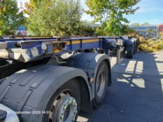 Dennison tri axle sliding skeletal trailer, Type F