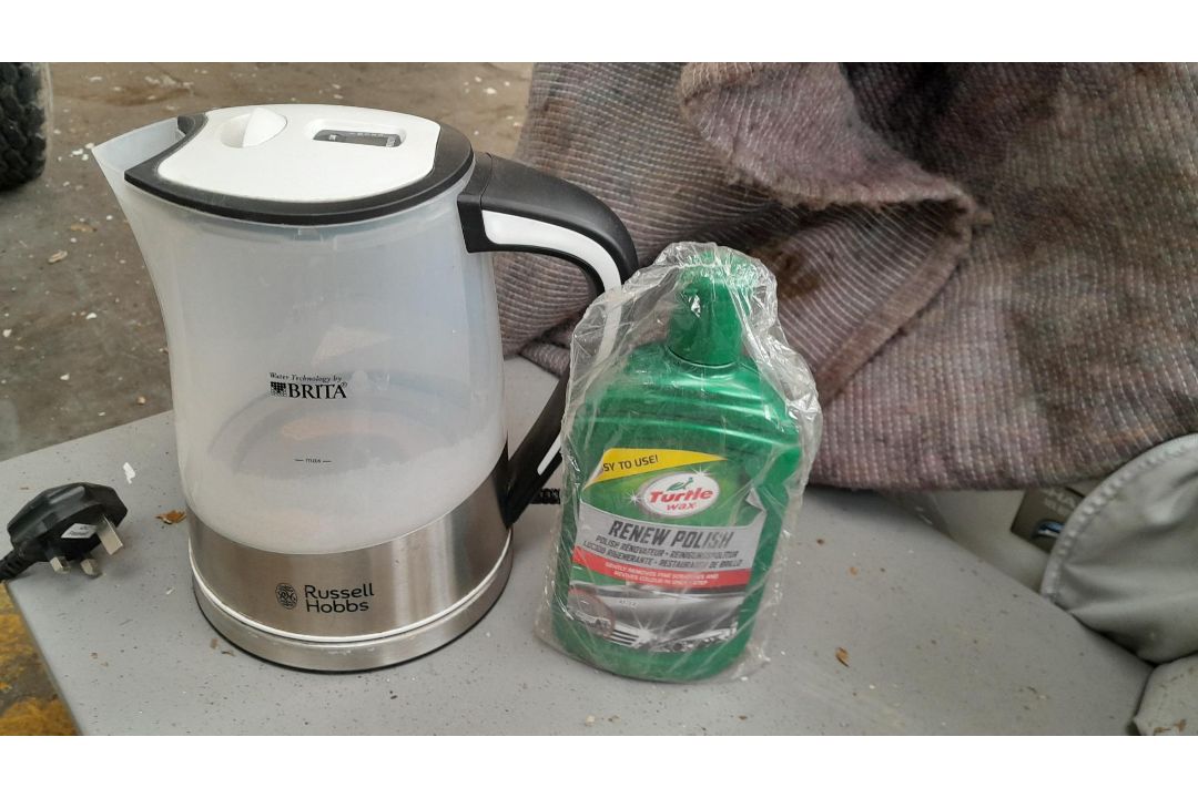 Russell Hobbs kettle and bottle of Turtle Wax poli - Image 1 of 2