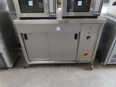 A S/Steel Cabinate on Caster Wheels.