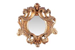 MIRROR IN A RICHLY CARVED BAROQUE FRAME | CENTRAL EUROPE (CENTRAL EUROPE)
