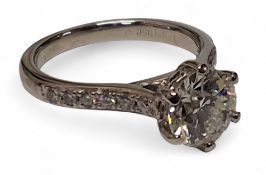 ****LOT WITHDRAWN****A platinum and diamond solitaire ring, six claw set brilliant cut round
