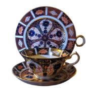 A Royal Crown Derby 1128 pattern teacup, saucer and side plate, printed mark,  made for T. Goode and