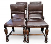 A set of four oak dining chairs, studded leatherette back and seat, bold forelegs, c.1930