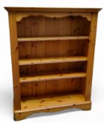 A Ducal Furniture pine open bookcase, adjustable shelves, 120cm high,  100cm wide,  31.5cm deep