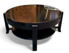 Mid Century Design - a black lacquered two tier circular coffee table, in the Oriental taste, 40cm
