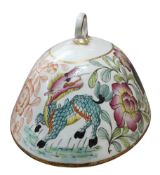 An 18th century Chinese domed tureen cover, painted with fanciful dragons, elephants and scrolling