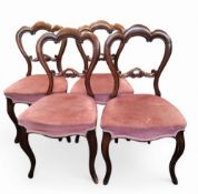 A set of four Victorian mahogany salon chairs, stuffed-over seats,  c.1860