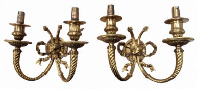 A pair of gilt metal two light, two branch wall lights, ribbon tied spirally turned arms, 24cm wide