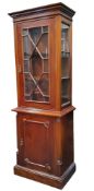 A reproduction mahogany display cabinet, moulded dentil  cornice above astragal glazed door and