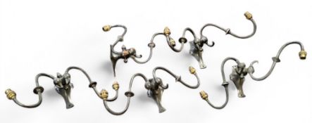 A set of five W.A.S. Benson Arts and Crafts  two-branch two-light pewter wall lights, long scroll