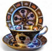 A Royal Crown Derby 1128 pattern  teacup, saucer and side plate, printed mark, date code for 1937,