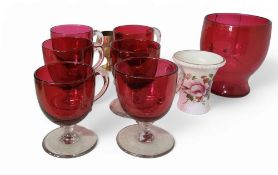 A set of six Victorian cranberry glass custard cups, clear glass handles and bases, 7.5cm high, c.