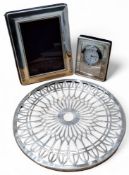 A silver mounted photograph frame, Ron Carr, Sheffield, 2002; a silver mounted miniature mantel