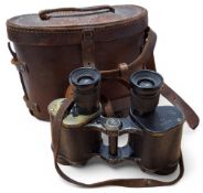 A cased pair of WWII Air Ministry binoculars, marked Watson & Baker and AM (Air Ministry) under