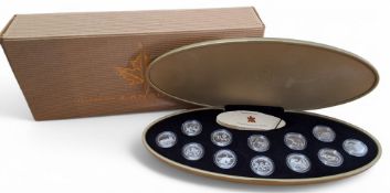 The Royal Canadian Mint Millennium Silver Coin Collection, twelve 925 silver 25 cent coins, each 5.