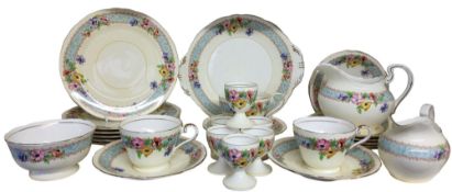 An Aynsley Anemone pattern part tea service, comprising six eggcups, two milk jugs, six dessert