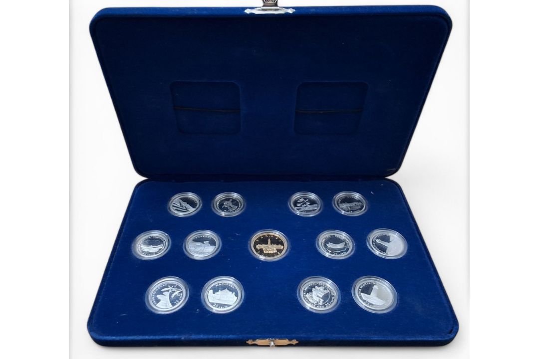 Royal Canadian Mint Commemorative Dollar and 25 Cent Set, each 925 silver 25 cent coin weighing