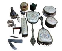 An early 20th century dressing table set;   a novelty camel trinket box;   plated napkin ring;