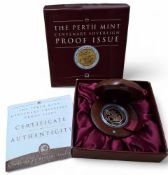 The Perth Mint Centenary Sovereign Proof Issue, a 22ct gold sovereign within a 999 silver border, (