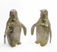A pair of novelty silver plated salt and pepper pots, in the form of penguins, 7cm high