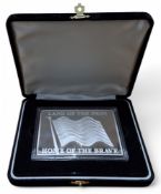 A Fine Silver Limited Edition Bullion Commemorative Plaque, the obverse in relief a United States