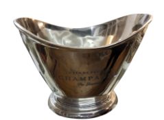 A contemporary  champagne bucket,  inscribed 'Cuvee de Prestige Champagne du Louvois', 26cm high