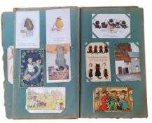 Postcards - an Art Nouveau album, partially filled with early 20th century examples including