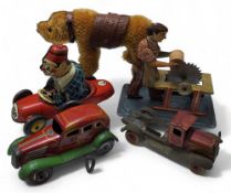 A Joustra tinplate tinplate clockwork Bimbo the Clown in race car, missing key (af); a Steiff