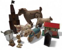A clockwork donkey, fly to hind leg, spinning tail, moving ears; a clockwork dog; a Brimtoys