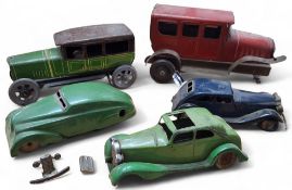 A pre-war German tinplate clockwork veteran car (af); a   Wells Brimtoy tinplate 'The Wonder Car',