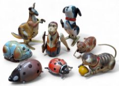 Vintage clockwork tinplate toys in the form of animals including an English Acrobat chimpanzee; a