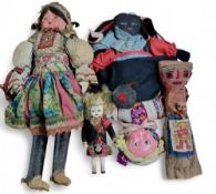 A Peruvian Chancay burial  doll, 29cm high;  an early 20th century topsy turvey doll, 41cm high;