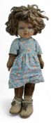 A Chad Valley Bambina girl doll, with pressed felt head, inset blue and white glass eyes, painted