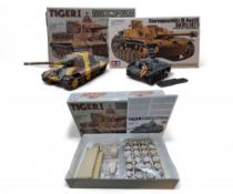 A Tamiya Tiger I Panzerkampfwagen VI Tiger 1 (Sd.kfz.181) AusfuhrungE Late Version, appears