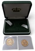 A Queen Elizabeth II full sovereign, dated 2006; a Queen Elizabeth II half sovereign, dated 2006;