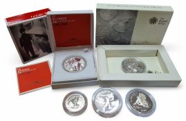 A Monnaie De Paris fine silver 10 franc coin, commemorating Yves St Laurent and the year 2000, in